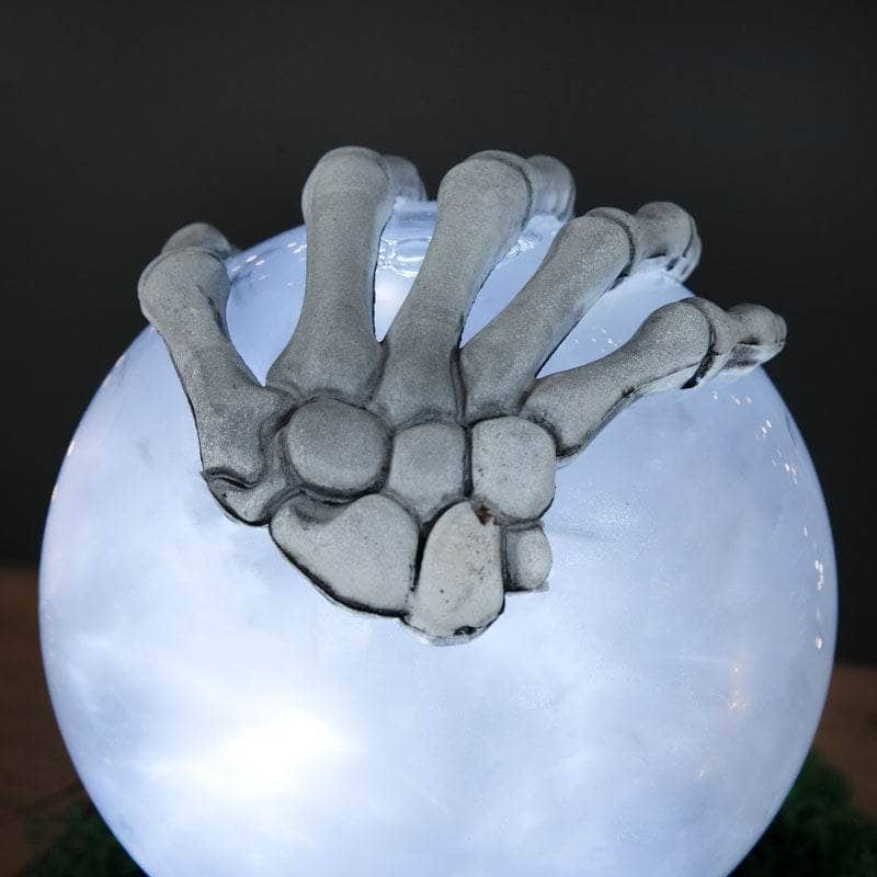 Light Up Skeleton Hand Water Globe