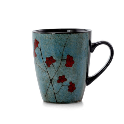 Service de table Elama Floral Accents en grès, 16 pièces, bleu.