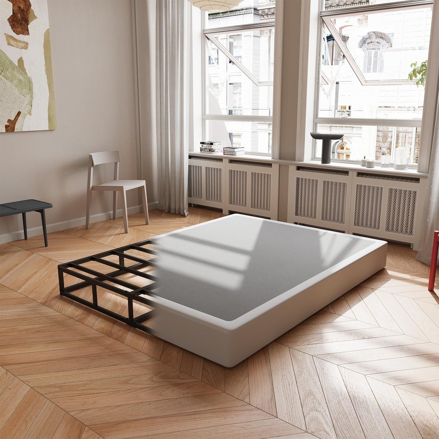 Ressort métallique à faible encombrement de 5 pouces, structure robuste avec revêtement gris.