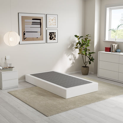 Ressort métallique à faible encombrement de 5 pouces, structure robuste avec revêtement gris.