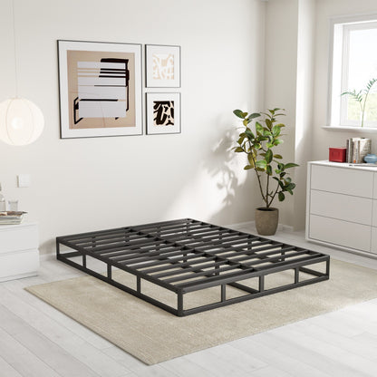 Ressort métallique à faible encombrement de 5 pouces, structure robuste avec revêtement gris.