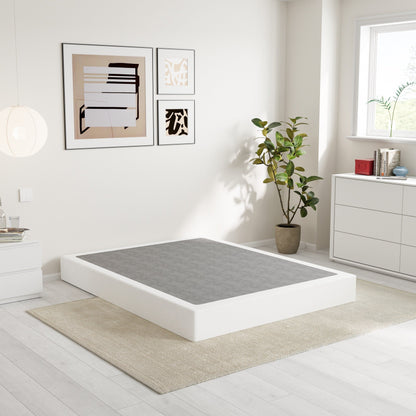 Ressort métallique à faible encombrement de 5 pouces, structure robuste avec revêtement gris.