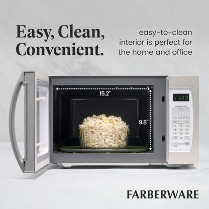 Four à micro-ondes Farberware Professional de 1,3 pi³ et de 1100 watts avec fonction de cuisson intelligente à détecteur, blanc et platine