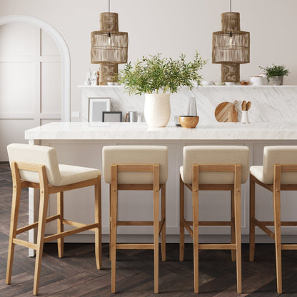 Tabouret de bar moderne Gracie, chaise rembourrée en bouclé et pieds en bois brossé