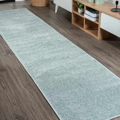 JONATHAN Y Tumbling Solid Low-Pile Area Rug