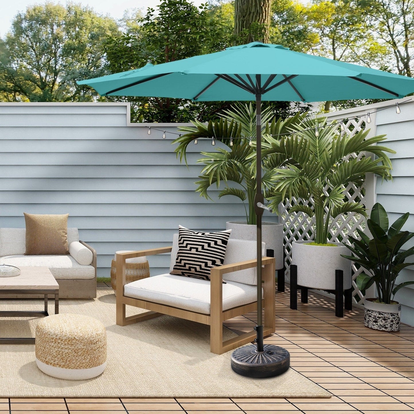 Parasol de terrasse Lopes de 2,7 m avec socle à poids bronze inclus.